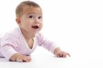 Portrait Of Playing Cute Baby Looking Upward Stock Photo