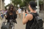 Man Photographing Girl On Street Stock Photo