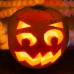 Carved Lit Halloween Pumpkin Stock Photo