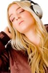 Young Lady Listening To Music Stock Photo