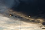 Light Poles In Evening Stock Photo