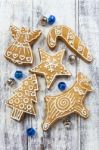 Christmas Gingerbread Cookies On White Table Stock Photo