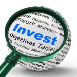 Invest Magnifier Definition Shows Put Money In Real State Or Inv Stock Photo