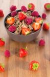 Bran Flakes With Fresh Raspberries And Strawberries Stock Photo