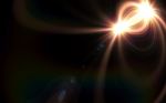 Lens Flare Light Over Black Background Stock Photo