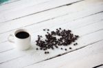 Coffee On White Wooden Panel Stock Photo