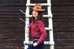 Happy Smiling Girl In Brown Stetson Stock Photo