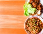 Thai Food (kaiyang-somtum) : Panaya Spicy Salad With Salted Crab And Grilled Chicken And Sticky Rice In Wicker Basket On Wooden Background,yummy Authentic Local Thai Food Somtum And Gaiyang, Papaya Spicy Salad And Griled Chicken With Purple Orchid Stock Photo