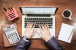 Top View Of Business Man Hands Working On Laptop Or Tablet Pc On Stock Photo