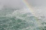 Beautiful Picture With The Water Near Amazing Niagara Falls With A Rainbow Stock Photo