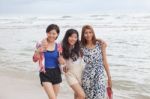 Portrait Of Young Beautiful Asian Woman Friend Relaxing Happy Emotion On Sea Beach Vacation Holiday Stock Photo