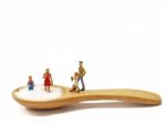 Miniature Little Children Standing On A Wooden Spoon And Thinking Of Sugar, Diet, Fat And Diabetes. Health Care Concept Stock Photo