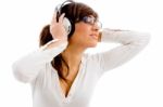 Female Listening Music Stock Photo