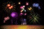 Firework Celebration From The Sea Shore Stock Photo