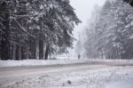 Snowfall And Sleet On Winter Road. Ice Snowy Road. Winter Snowst Stock Photo