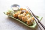 Wonton On Wood Blackground Stock Photo