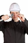 Handyman Wearing Uniform And Hardhat Stock Photo