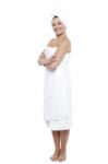 Pretty Woman Wrapped In White Towel After Bath Stock Photo