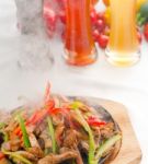 Original Fajita Sizzling Hot  On Iron Plate Stock Photo