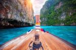 Long Boat And Blue Water At Maya Bay In Phi Phi Island, Krabi Thailand Stock Photo