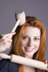 Young Woman With A Wooden Rolling Pin Stock Photo