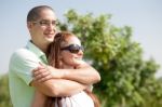 Young Couple Hugging Stock Photo