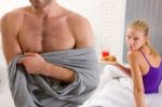 Couple Having Breakfast In Bed Stock Photo