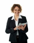 Aged Businesswoman Using tablet PC Stock Photo