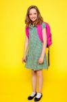 Smiling School Girl Carrying Bag Stock Photo