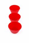 Red Plastic Cups For Small Cakes On White Stock Photo