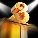 Golden Three On Pedestal Displays Entertainment Awards Or Recogn Stock Photo