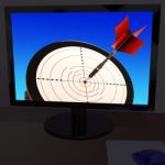 Arrow Aiming On Monitor Showing Performance Stock Photo