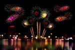 Fireworks Celebration And The City Night Light Background Stock Photo