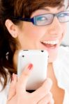 Smiling Female Holding Ipod Stock Photo