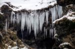 View Of Skogafoss Waterfall In Winter Stock Photo