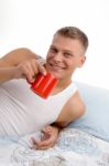 Smiling Man Having Coffee Stock Photo