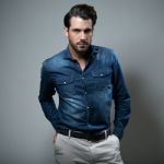 Elegant Young Handsome Man. Studio Fashion Portrait Stock Photo