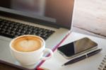 Coffee Latte On Work Table Stock Photo