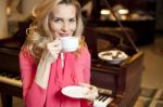 Beautiful Young Girl Drinking Coffee Stock Photo