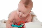 Sweet Little Baby Playing With Toy Stock Photo