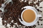 Hot Coffee Cup And Beans Stock Photo