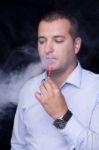 Smoking Electric Cigarettes Stock Photo