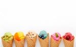 Various Of Ice Cream Flavor In Cones Blueberry ,strawberry ,pist Stock Photo