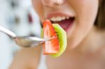 Beautiful Young Woman Enjoying Breakfast At Home Stock Photo