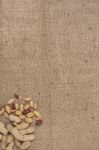 Peanuts On A Burlap Background Stock Photo