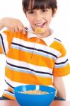 Young Boy Having His Breakfast Stock Photo