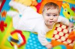 Infant Boy On Playmat Stock Photo