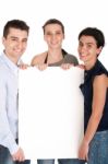 Brother And Sisters Holding Banner Stock Photo