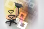 Graduation Hat In Office Chair Stock Photo