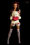 Young Woman With A Teddy Bear Wearing Lingerie Stock Photo